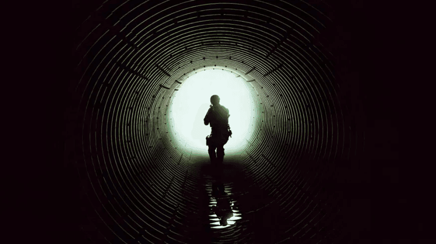 Film frame from Sicario showing silhouette against sunset